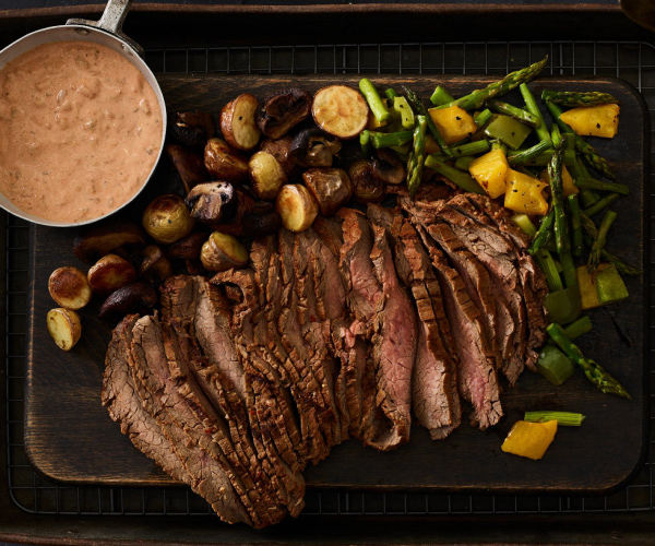 Six-Chili Beef Flank Steak with Southwest Tomato Cream and Roasted Vegetables