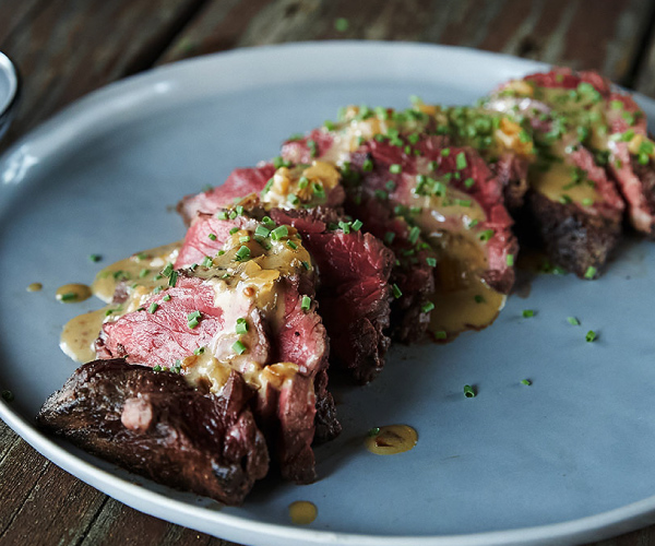 Hanger Steak With Mustard And Caramelized Onions Recipe | Blue Rhino