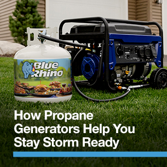 Propane generator with a Blue Rhino tank attached, sitting on the grass infront of a house.