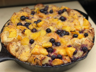 Skillet Peach & Blueberry Bourbon Bread Pudding