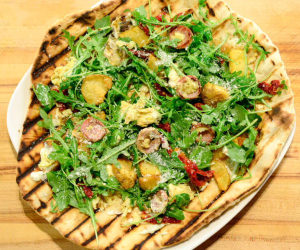 Grilled Breakfast Pizza With Turkey Sausage, Scrambled Eggs, Potatoes And Arugula Recipe