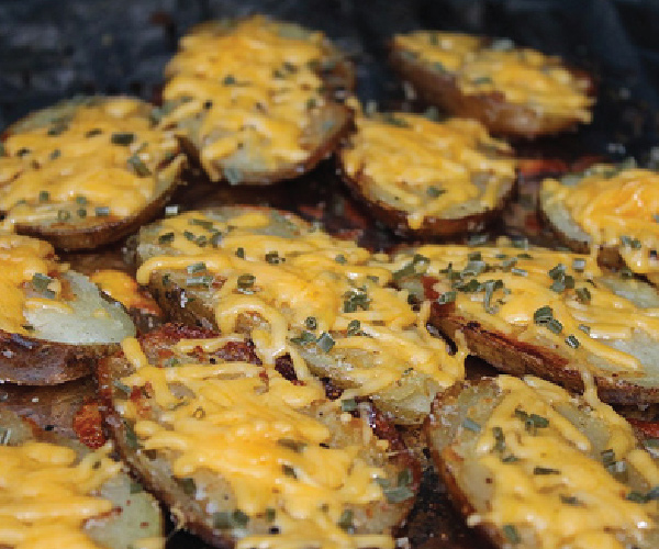 A recipe that will delight you and your guests. This cheesy masterpiece will leave you wanting more. Try these Grilled Potato Skins the first chance you get.