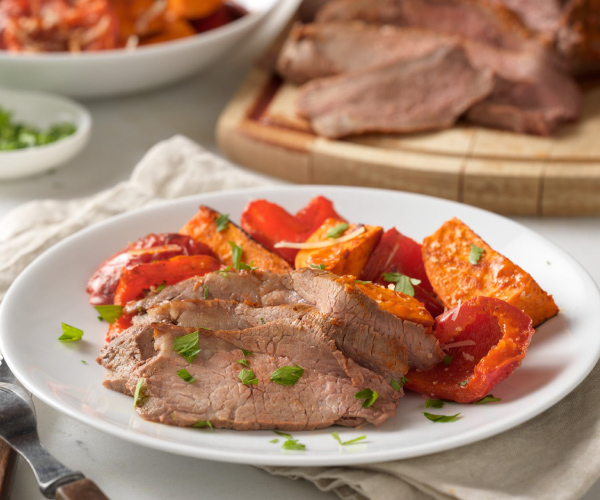 Roasted Sun-dried Tomato Beef Tri-tip with Peppers and Sweet Potatoes Recipe | Blue Rhino