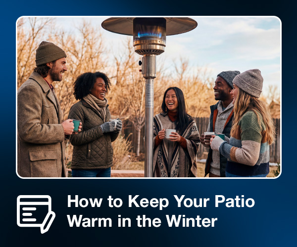 Group of friends wearing winter attire standing outside on a patio around a large patio heater.