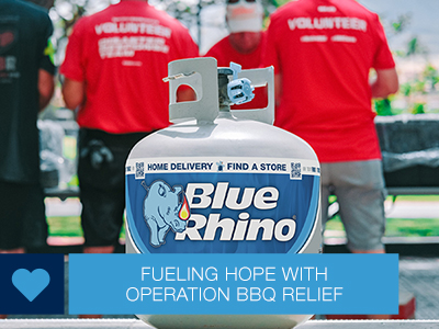 Fresh Blue Rhino tank, with volunteers at Operation BBQ Relief working in the background.