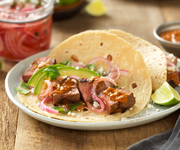 Grilled Adobo Beef Steak Tacos with Creamy Chipotle Salsa and Tequila Pickled Red Onions Recipe | Bl