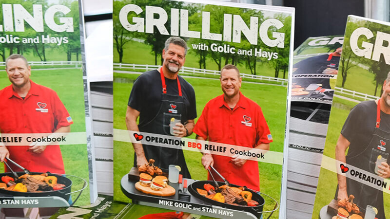 Multiple OBR Cookbooks on a table.